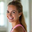 Portrait of Emily R., smiling woman in her late 30s