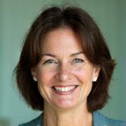 Sarah M., 42, smiling contentedly