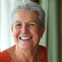 Portrait of Chloe S., a serene woman over 50, with a gentle smile.